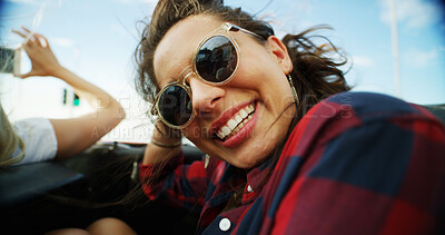 Buy stock photo Smile, women and sunglasses in convertible for road trip adventure, travel break and breeze outdoor. People, friends and laugh in sports car with scenery drive, transport journey and summer vacation