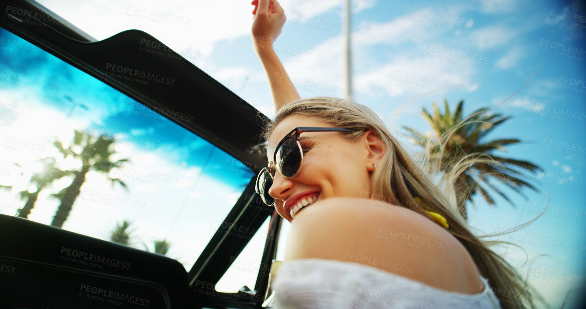 Buy stock photo Woman, freedom and sunglasses in car of road trip adventure, travel break and blue sky. Happy, female person and convertible vehicle of scenery drive, transport journey and summer vacation in Florida