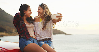 Buy stock photo Road trip, girls and selfie at beach for travel, vacation and holiday outdoor at ocean. Car, happy women and picture on journey for memory, social media post and laughing together with mockup space
