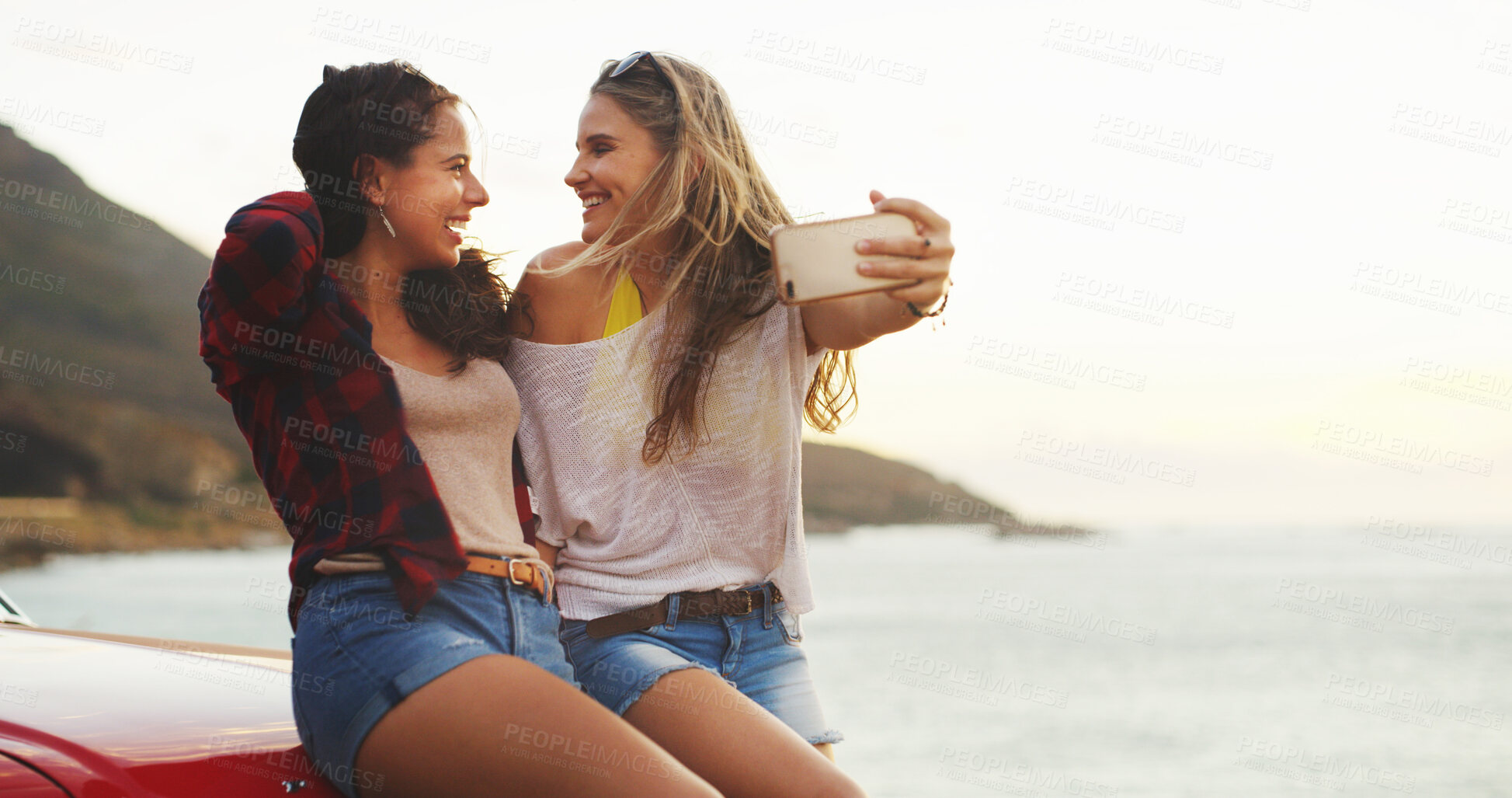 Buy stock photo Road trip, girls and selfie at beach for travel, vacation and holiday outdoor at ocean. Car, happy women and picture on journey for memory, social media post and laughing together with mockup space