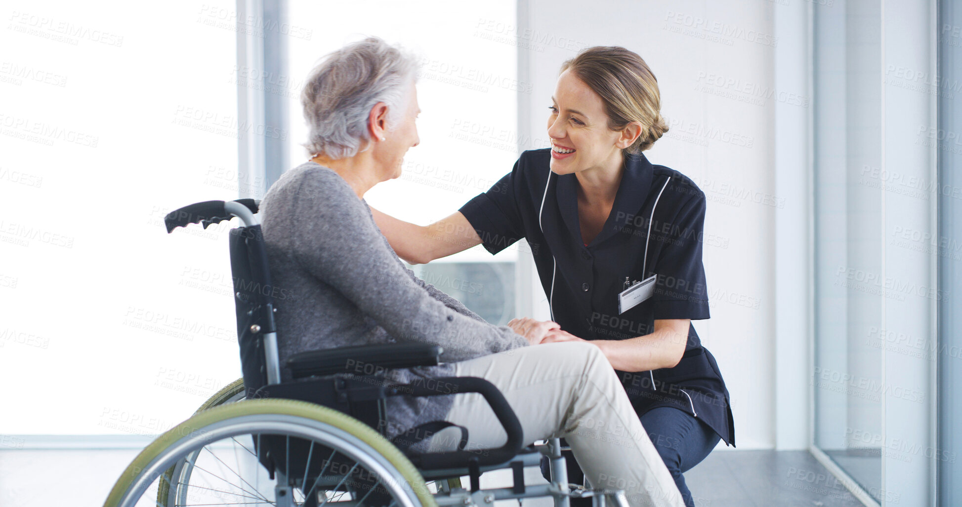 Buy stock photo Elderly woman, caregiver or smile in nursing home with support, trust or friendly service. Senior care, people or patient with disability in retirement center for rehabilitation, recovery or wellness