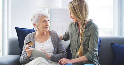 Buy stock photo Daughter, senior woman and credit card with tablet in home for online shopping, internet banking support or help. Ecommerce, family or teaching mother with bills payment, web purchase or subscription