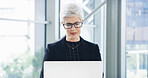Reading, search and laptop with business woman in office for corporate venture capital, email agenda or private equity. Planning, finance return and schedule with mature employee for portfolio assets