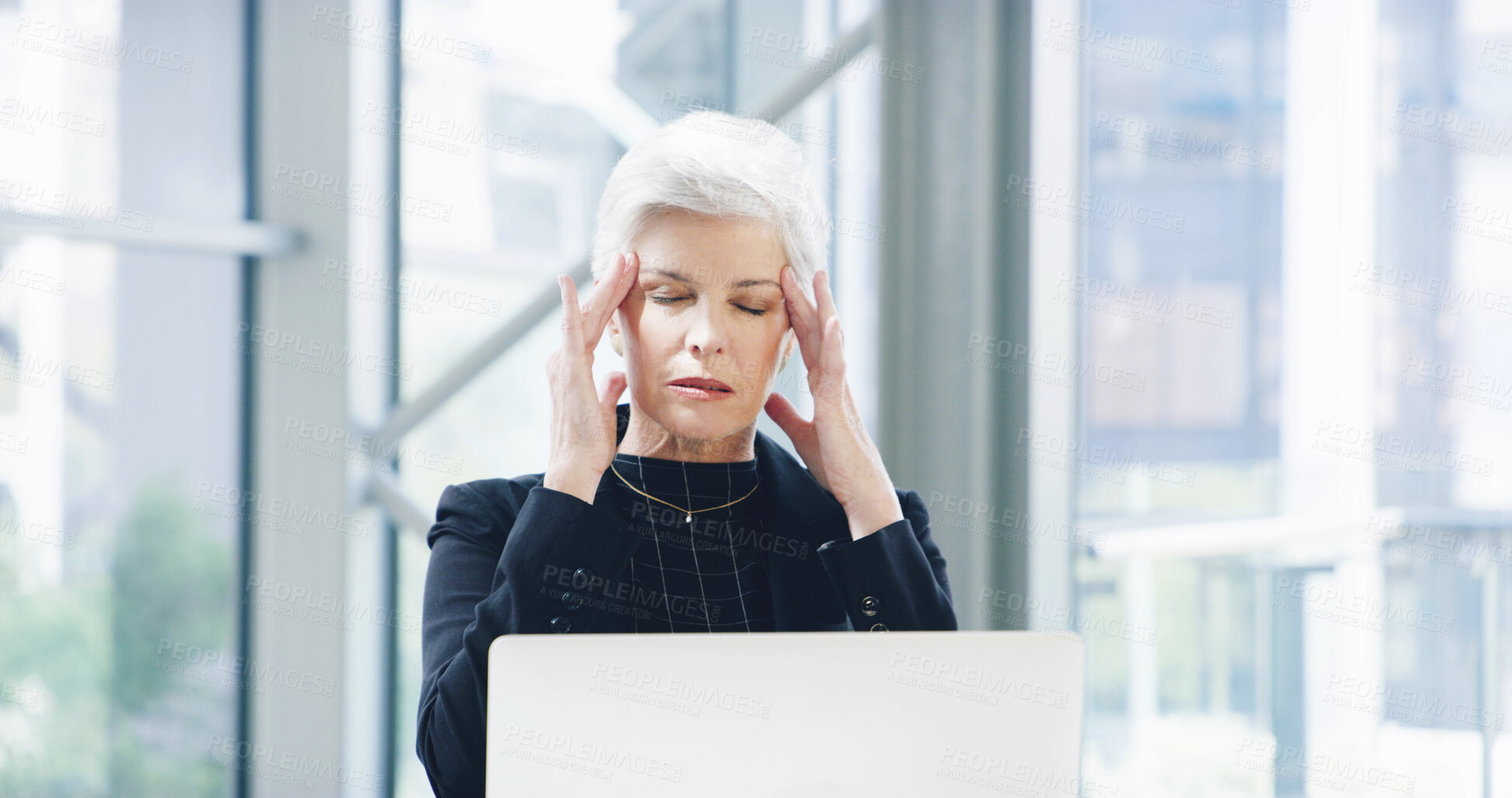 Buy stock photo Headache, laptop and mature woman in office, stress and difficult audit with burnout. Person, employee and accountant in workplace, computer or migraine with anxiety, pain or overworked with deadline
