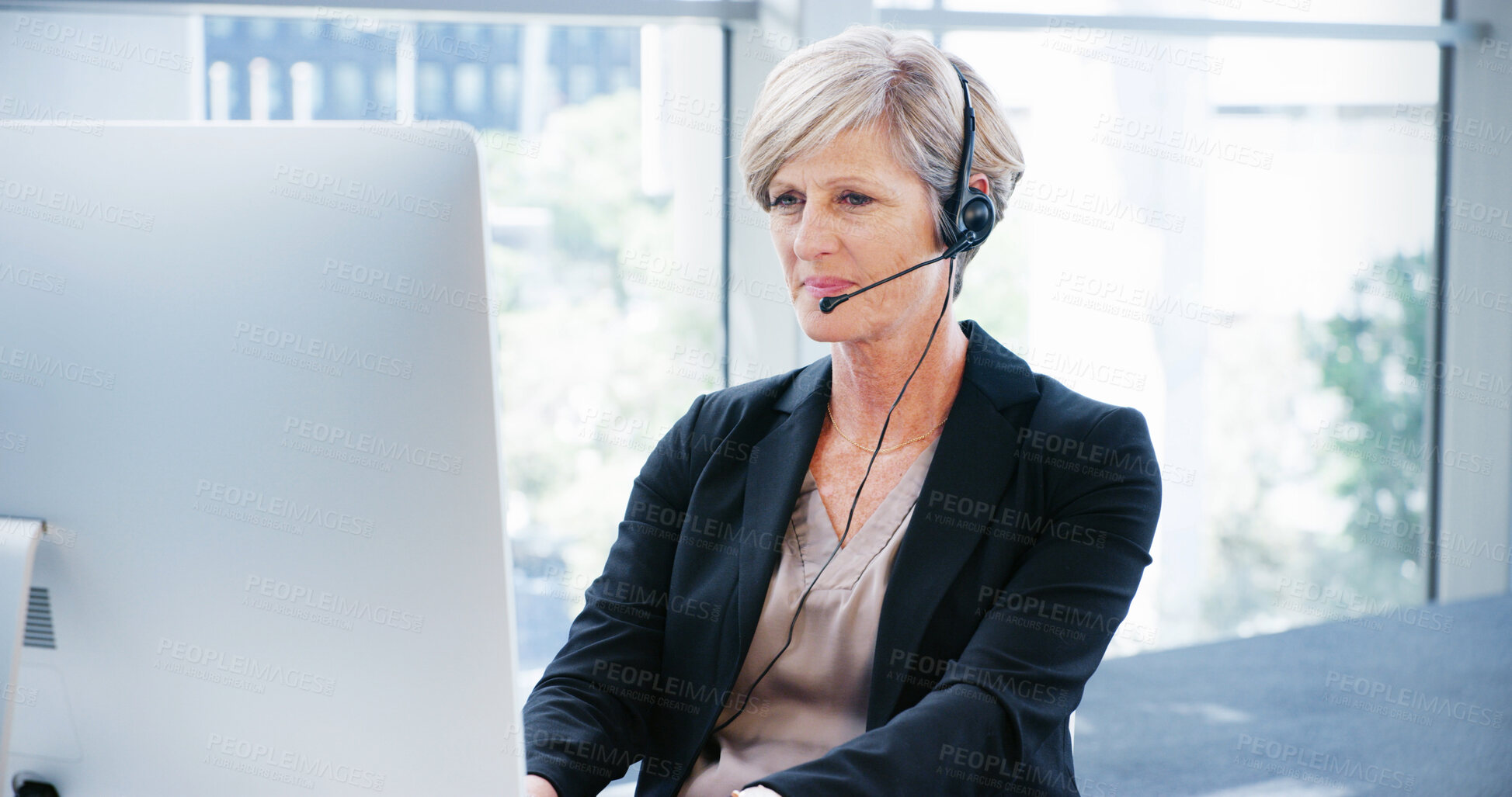 Buy stock photo Computer, headset and mature business woman in office for consulting, proposal and project or online research. Corporate attorney, lawyer and crm support on technology for report, email and planning