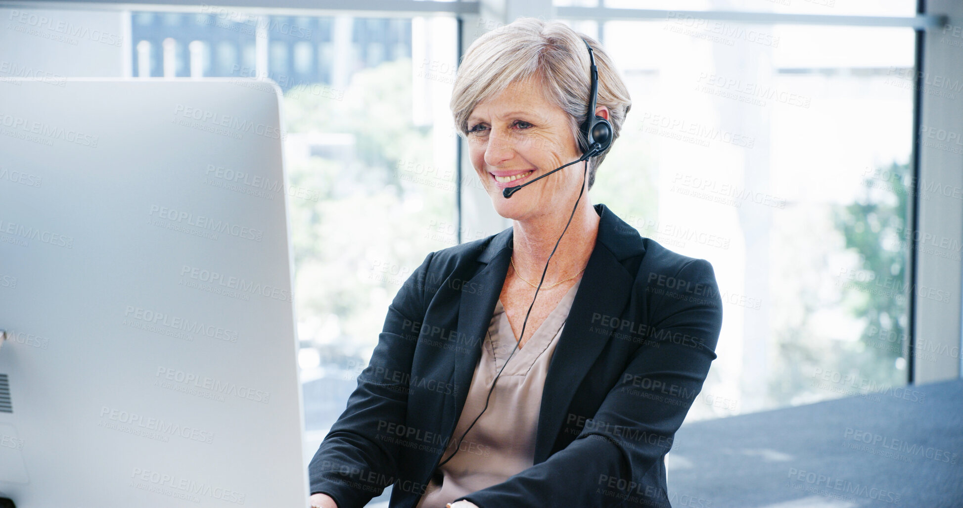 Buy stock photo Computer, headset and business woman for consulting, proposal and project for online research in office. Mature corporate attorney, lawyer and crm support on tech for report, email and communication