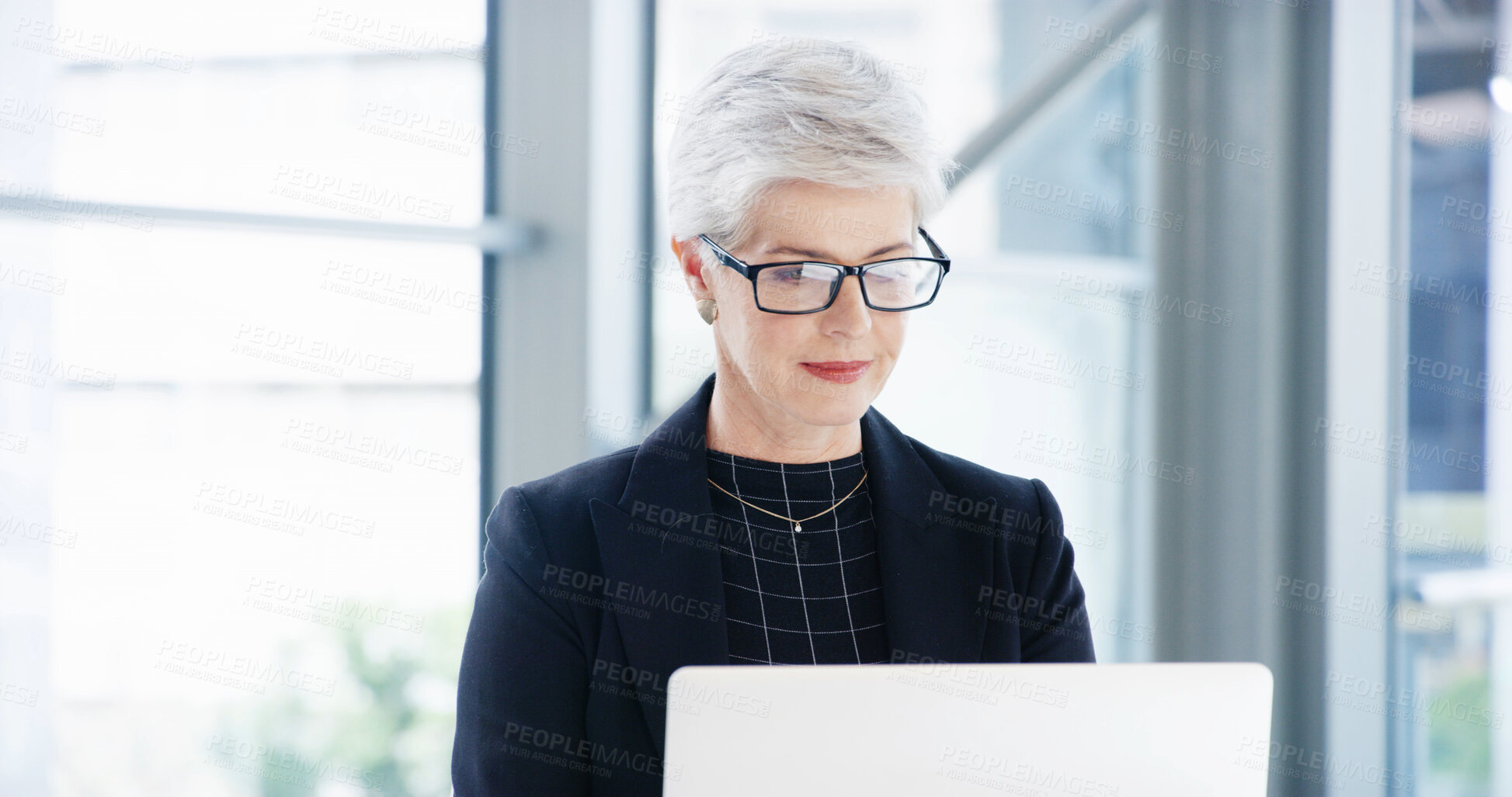 Buy stock photo Reading, laptop and glasses with business woman in office for debt solution, loan application and update. Bank manager, client portfolio and research with mature person in finance firm for email