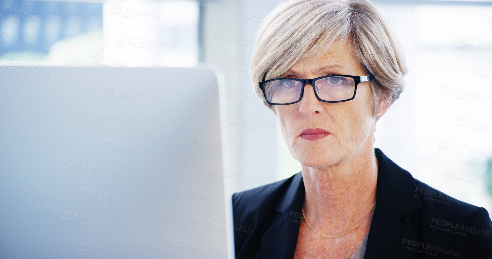 Buy stock photo Computer, business woman and serious thinking for legal case, proposal and project or online research. Corporate attorney, mature lawyer and worker for consultant report, office email and planning