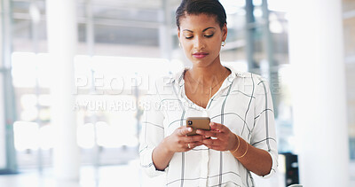 Buy stock photo Typing, phone and business woman in office with online notification, message and networking. Professional, corporate and worker on smartphone for social media, communication and b2b contact in lobby
