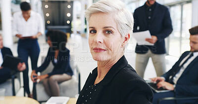 Buy stock photo Confident, meeting and portrait of mature businesswoman in office for negotiation on real estate law case. Serious, professional and female attorney with team for legal property transaction deal.