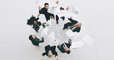 Buy stock photo Business people, above and throw paper for success, goals and happy for profit, chart and diversity in office. Men, women and circle with team, celebration and results with revenue at investment firm