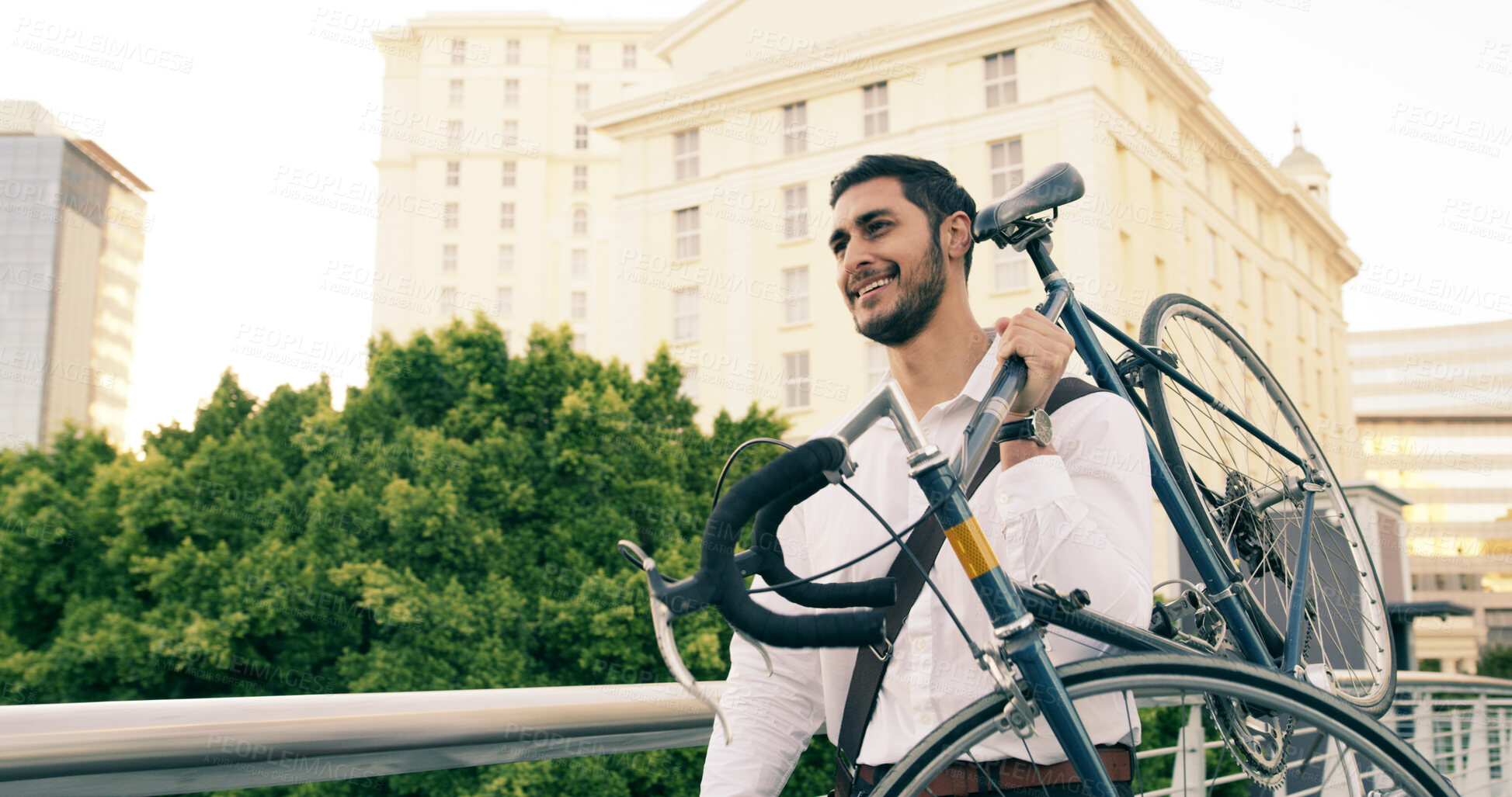 Buy stock photo Businessman, smile and carry bicycle in city for commute or sustainable travel for trip in town. Thinking, happy or walking with bike for eco friendly transportation on urban sidewalk street in Egypt