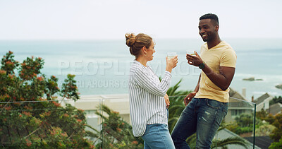 Buy stock photo Travel, ocean and couple cheers on hotel terrace for tropical vacation with drinks, relax and bonding together. Cocktail, man and woman at beach resort with toast, smile and love on island holiday