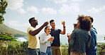Balcony, drinking and toast with friends outdoor together for celebration, holiday or vacation. Alcohol, bonding or smile with man and woman group at mountain hotel for accommodation or hospitality