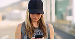 Typing, smartphone and woman in city, travel and message to contact, texting and social media. Outdoor, person and girl in street, cellphone and mobile app with internet, communication and commute