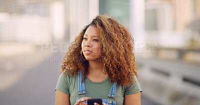 Buy stock photo Phone, thinking and walking with woman on bridge in city to search map app for directions to location. Future, idea and planning with African person outdoor in urban town for commute or travel