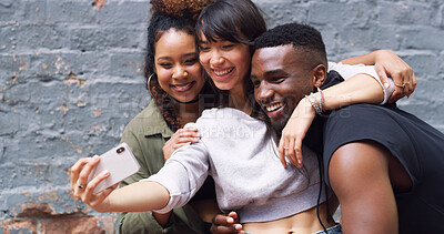 Buy stock photo Selfie, smile and group of friends by wall in city for memory, social media or profile picture on holiday. Reunion, influencers and young people with photography for content creation vlog in town