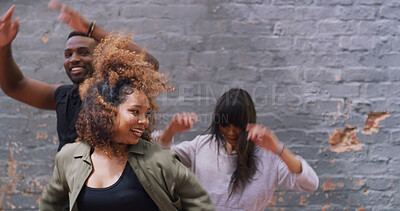 Buy stock photo Dance, celebration and group of friends at wall with energy, support or winning college achievement. Diversity, man and women on campus with fun, creative dancer and happy team of university students