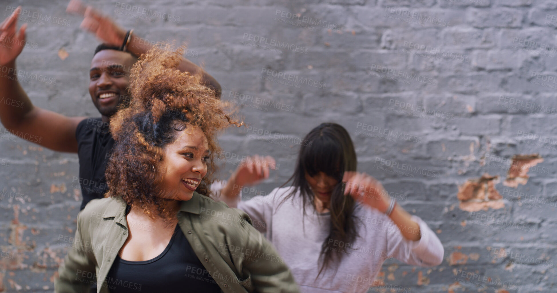 Buy stock photo Dance, celebration and group of friends at wall with energy, support or winning college achievement. Diversity, man and women on campus with fun, creative dancer and happy team of university students