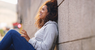 Buy stock photo Wall, thinking and woman in city, sitting and smile with daydreaming, wonder and relax. Person, comfort and girl with break, thoughtful and decision with choice, solution and problem solving