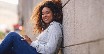 Buy stock photo Portrait, relax and woman with earphones, street and listening to music for break, outdoor and playlist. Happy, streaming and subscription to app for audio, online or person with connection for sound