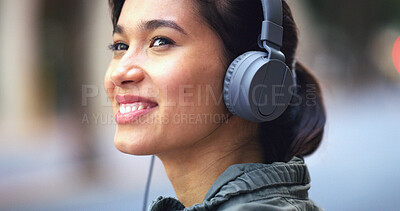 Buy stock photo Headphones, travel and woman in city with music for commuting to university in morning. Happy, audio tech and female student walking and listening to online playlist, podcast or radio in urban town.