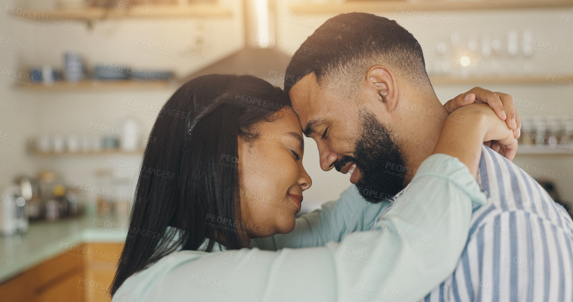 Buy stock photo Love, dance and happy with couple in kitchen for support, music and bonding. Celebration, smile and marriage with man and woman hugging at home for romantic memory, embrace and care together