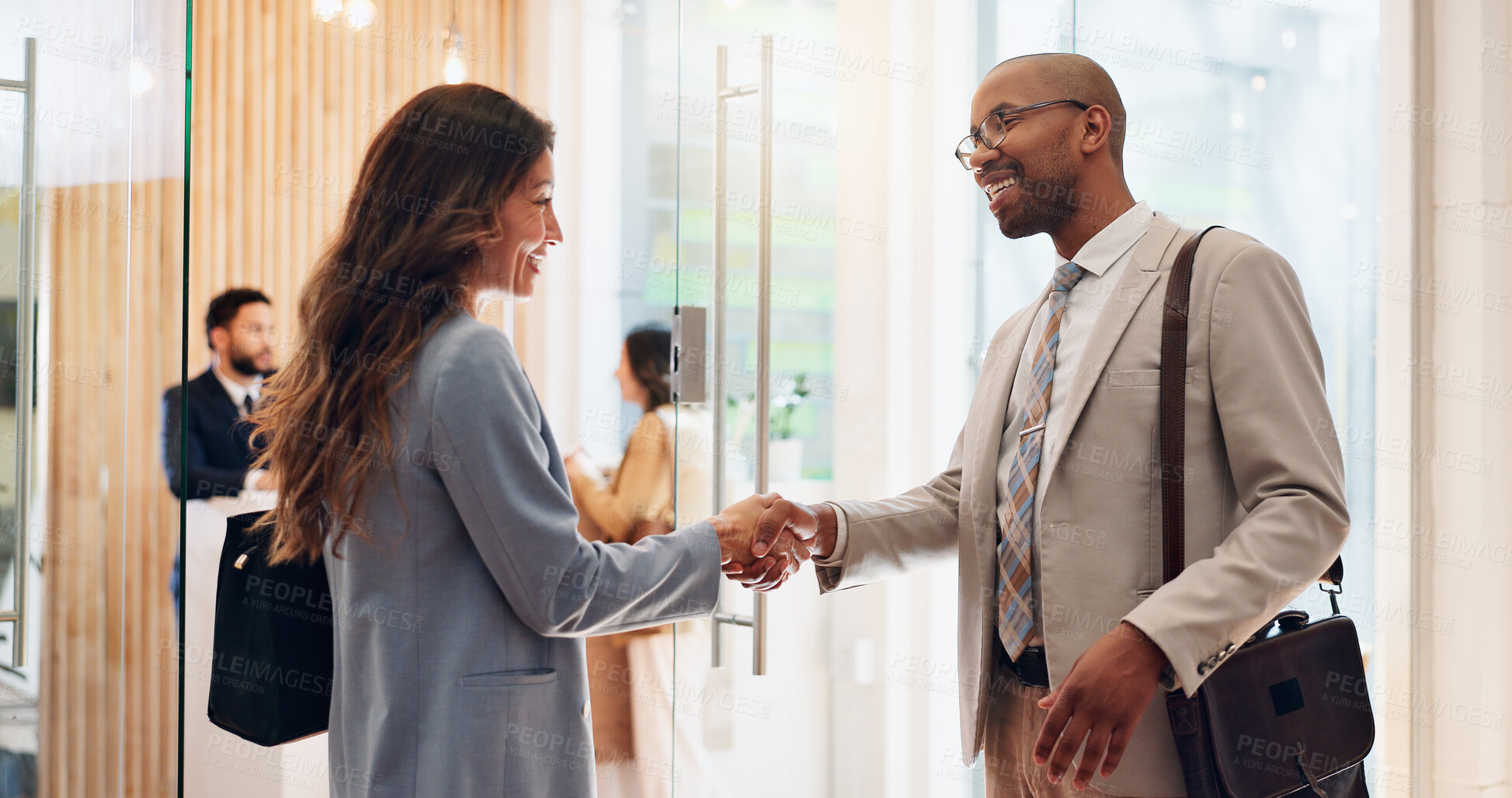 Buy stock photo Handshake, smile and welcome with business people in lobby of office for friendly greeting. Agreement, hello or introduction with human resources manager and employee shaking hands at orientation