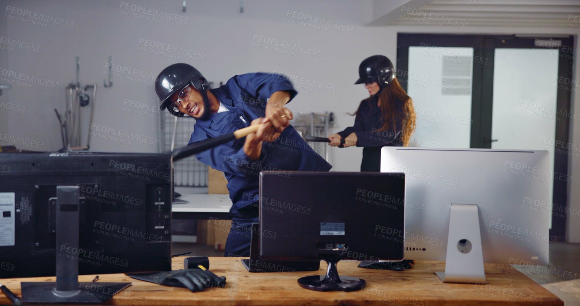 Buy stock photo Computer, bat and friends in rage room for frustrated, anger management and stress relief. Weapon, safety gear and violence with people in smash center for demolition break and cathartic therapy