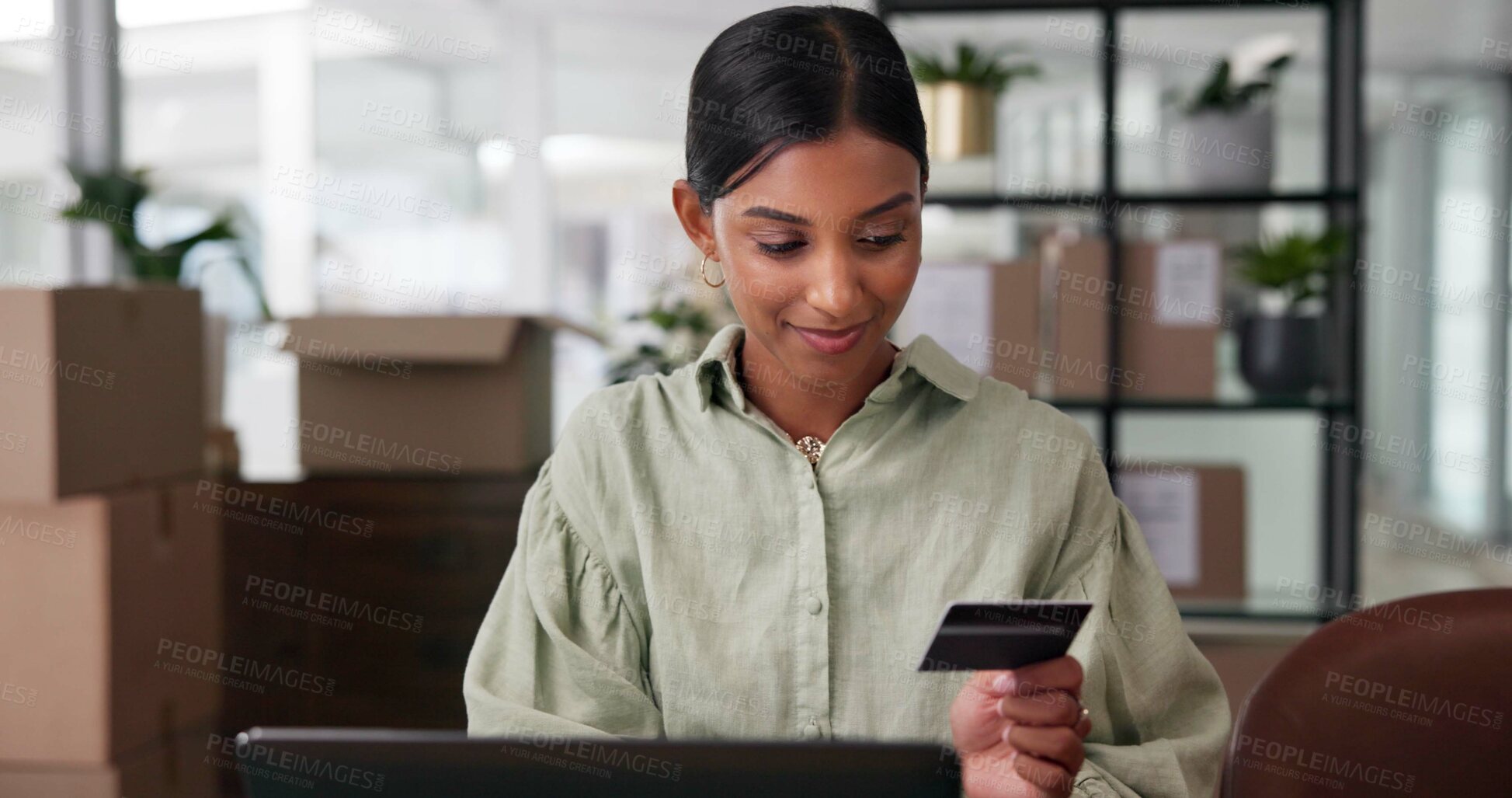 Buy stock photo Small business, smile and woman with card, office and thinking of purchase for stock, boxes and web. Warehouse, entrepreneur and person with credit for supplies, ecommerce and planning for payment
