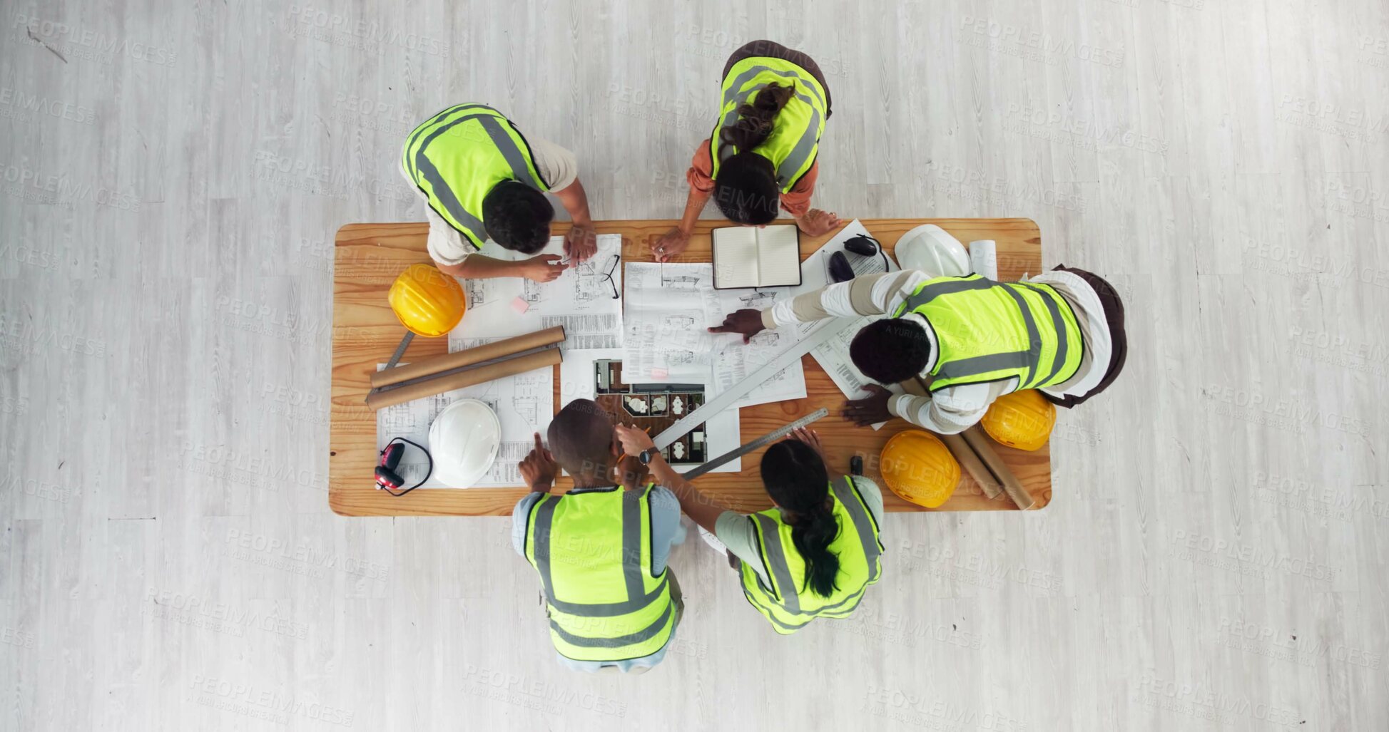 Buy stock photo Above, architecture or people in meeting for planning, building design or strategy at space. Engineer team, collaboration or blueprint in office for home renovation, urban development or construction