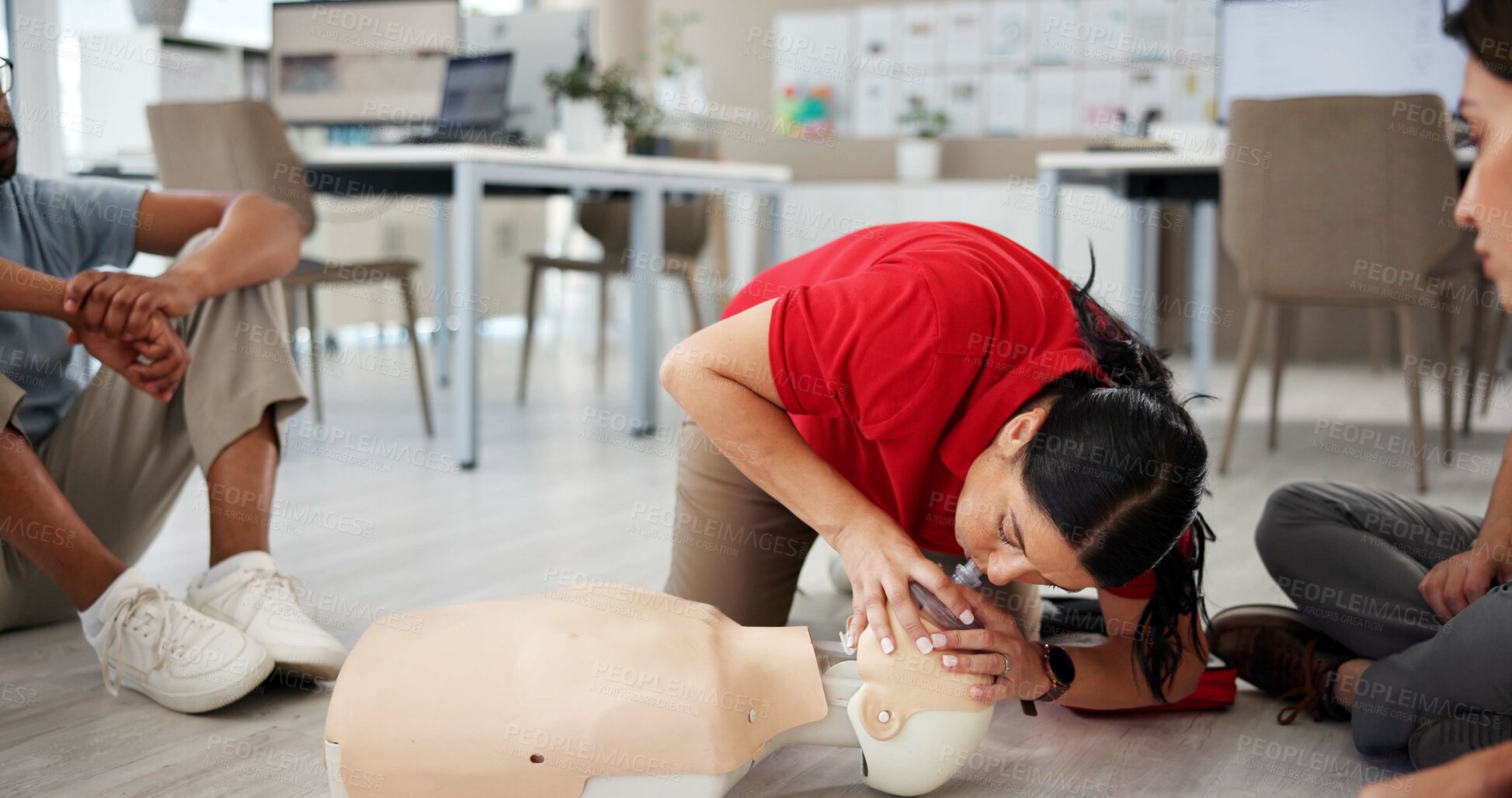 Buy stock photo First aid, cpr training and respirator mask with dummy for healthcare, breath or resuscitation for office safety. Paramedic course, medical demonstration and teaching group emergency rescue technique