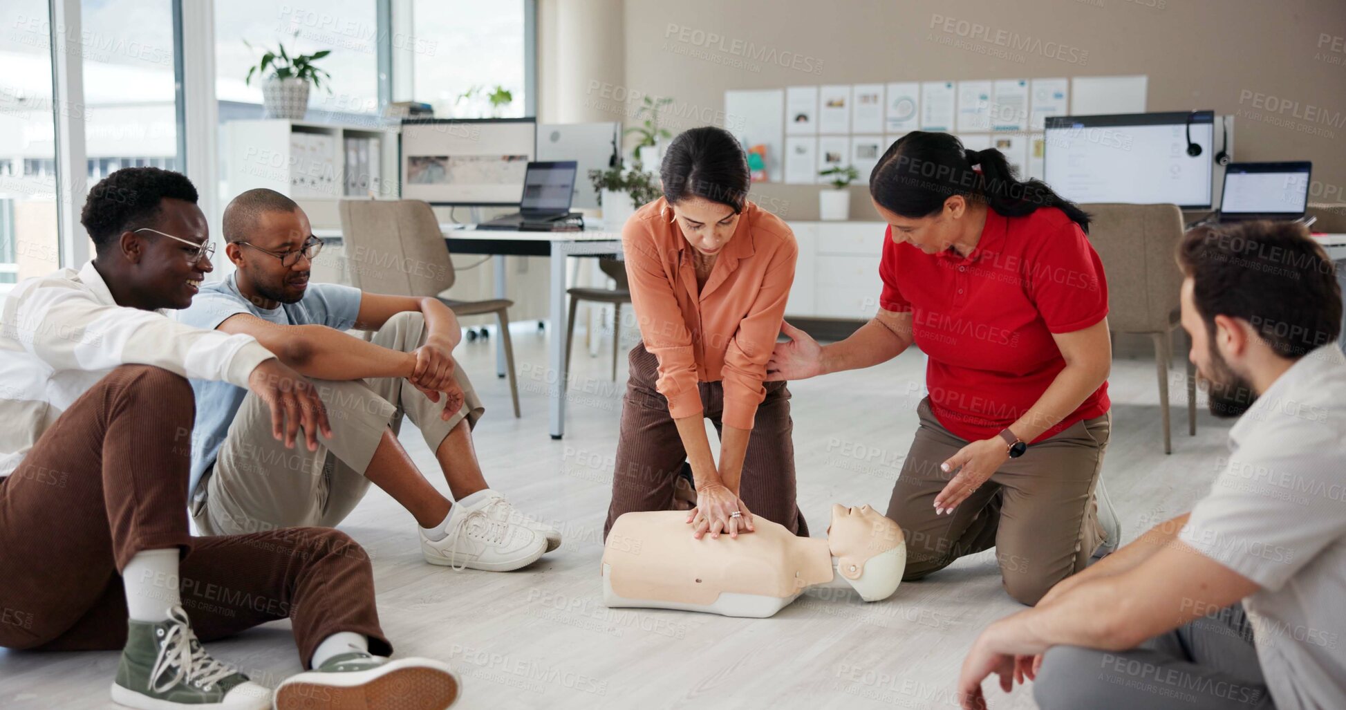 Buy stock photo First aid, cpr training and group with dummy for safety compliance, health and chest compression for breathing. Paramedic course, learning and teaching people emergency rescue technique in office