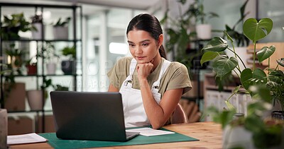 Buy stock photo Laptop, online order and thinking with woman in flower shop for sale of floral arrangements. Computer, planning and plant nursery with florist at desk in office of small business to check inventory
