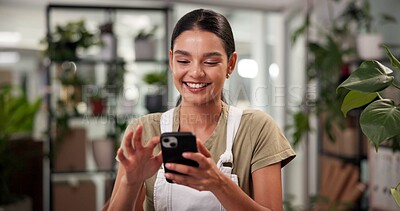 Buy stock photo Phone, woman and florist in store for order review with small business at startup flower shop. Happy, cellphone and female botanist on mobile app for floral biology research in retail plant nursery.