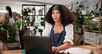Inventory, laptop and online order with woman in flower shop for sale of floral decoration. Computer, plant nursery and typing with African florist at desk in office of small business for delivery