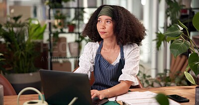 Buy stock photo Laptop, online order and thinking with woman in plant shop for sale of floral decoration. Computer, nursery and typing with serious florist at desk in office of small business for delivery ideas