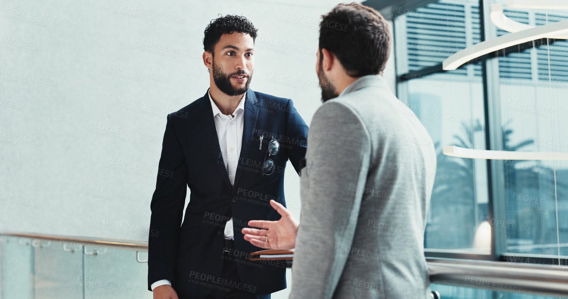 Buy stock photo Talking, project or business people in lobby for feedback, schedule update or conference hall advice. Men, employees or keynote speaker with manager in office for networking, seminar or event review