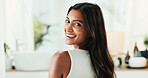 Home, portrait and woman with smile for hair care, growth cosmetics and soft texture with beauty. Bathroom, female person and satisfied with treatment for hairstyle, smooth and keratin in apartment