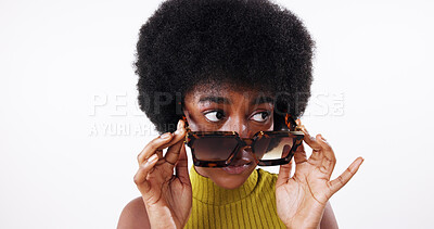 Buy stock photo Peeking, sunglasses and black woman in studio, question and attitude on white background. African person, model and girl with shades, eyewear and curious with style, interesting and information