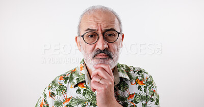 Buy stock photo Glasses, portrait, thinking with mature man in studio for choice or decision on holiday destination. Idea, planning and vision with old tourist person on white background for travel or vacation