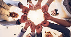 Happy, business people or meeting with fist bump below for unity, motivation or teamwork at office. Low angle, employee or group with touch, smile or trust for mission, synergy or solidarity together