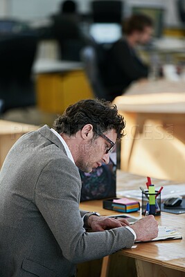 Buy stock photo Man, notebook and writing with planning by desk for daily schedule, brainstorming and idea for business. Modern office, male lawyer and notes for legal case with agenda, checklist and administration