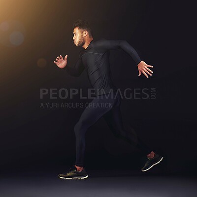 Buy stock photo Running, fitness and man with workout, exercise and training on a black studio background. Person, mockup space and model with breathing and runner with cardio and athlete with confidence or wellness
