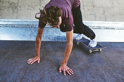 Buy stock photo Man, skateboard and tricks with sport in city for street skating, extreme or balance at urban skate park. Male person, hipster or stunt with slide or glide in motion on asphalt turf for moves in town