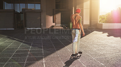 Buy stock photo Skateboard, sports and back of man in city for fitness, practice and energy in New York. Active, skater or male person skating on concrete in urban town for outdoor talent, skill competition or hobby