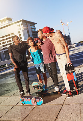 Buy stock photo People, talking and skateboard with fitness in city of bonding together, streetwear and exercise. Group, friends and hug for sports practice, activity performance and summer fun for adventure in town