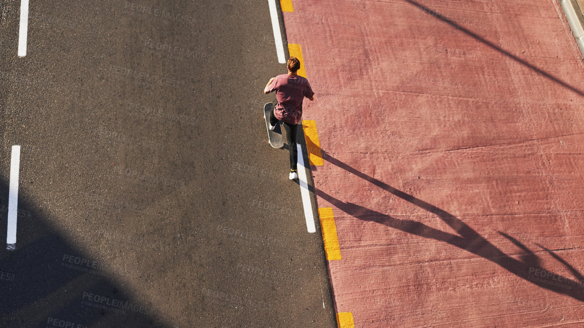 Buy stock photo Travel, above and person with skateboard, sport and practice for competition on road, outdoor or city. Morning, athlete and training for game on street, high angle or skateboarder with speed or space