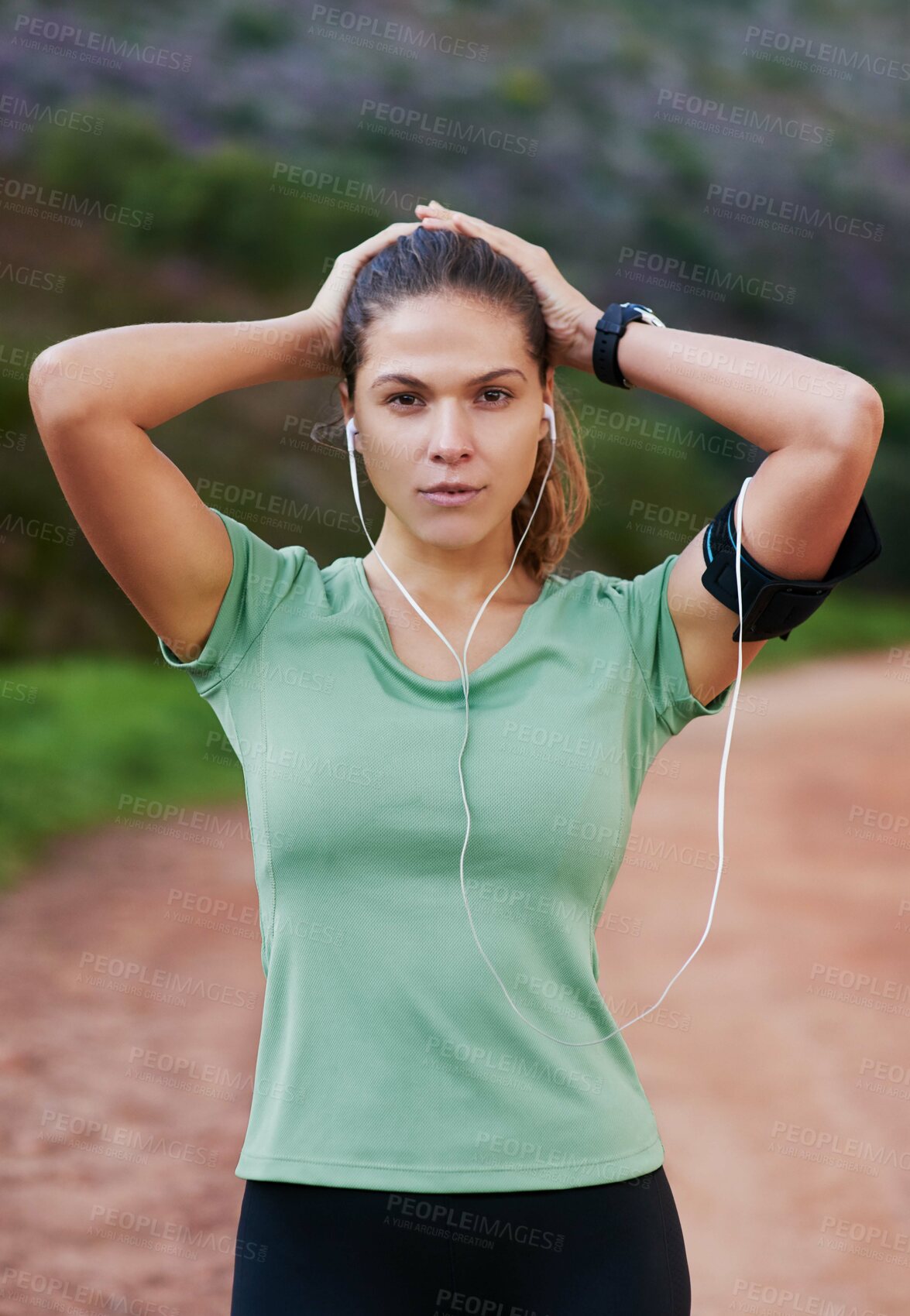 Buy stock photo Fitness, portrait and woman tired on run and breathing to rest with music in headphones in exercise or workout. Athlete, break and girl training in summer with resilience for challenge in countryside