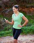 Choosing music that will motivate her on the run